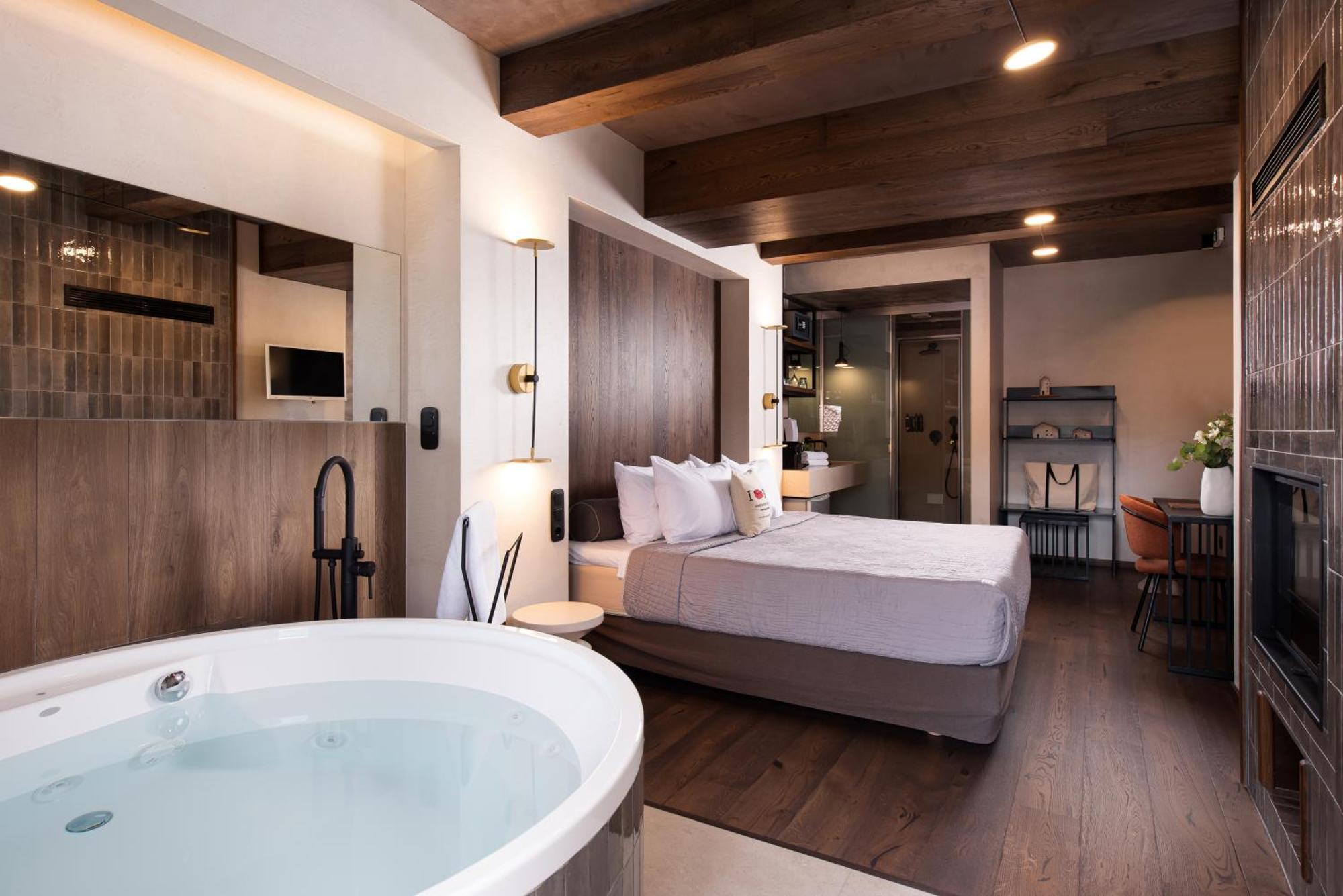 The Jacuzzi Suite with Fireplace & Steam Shower